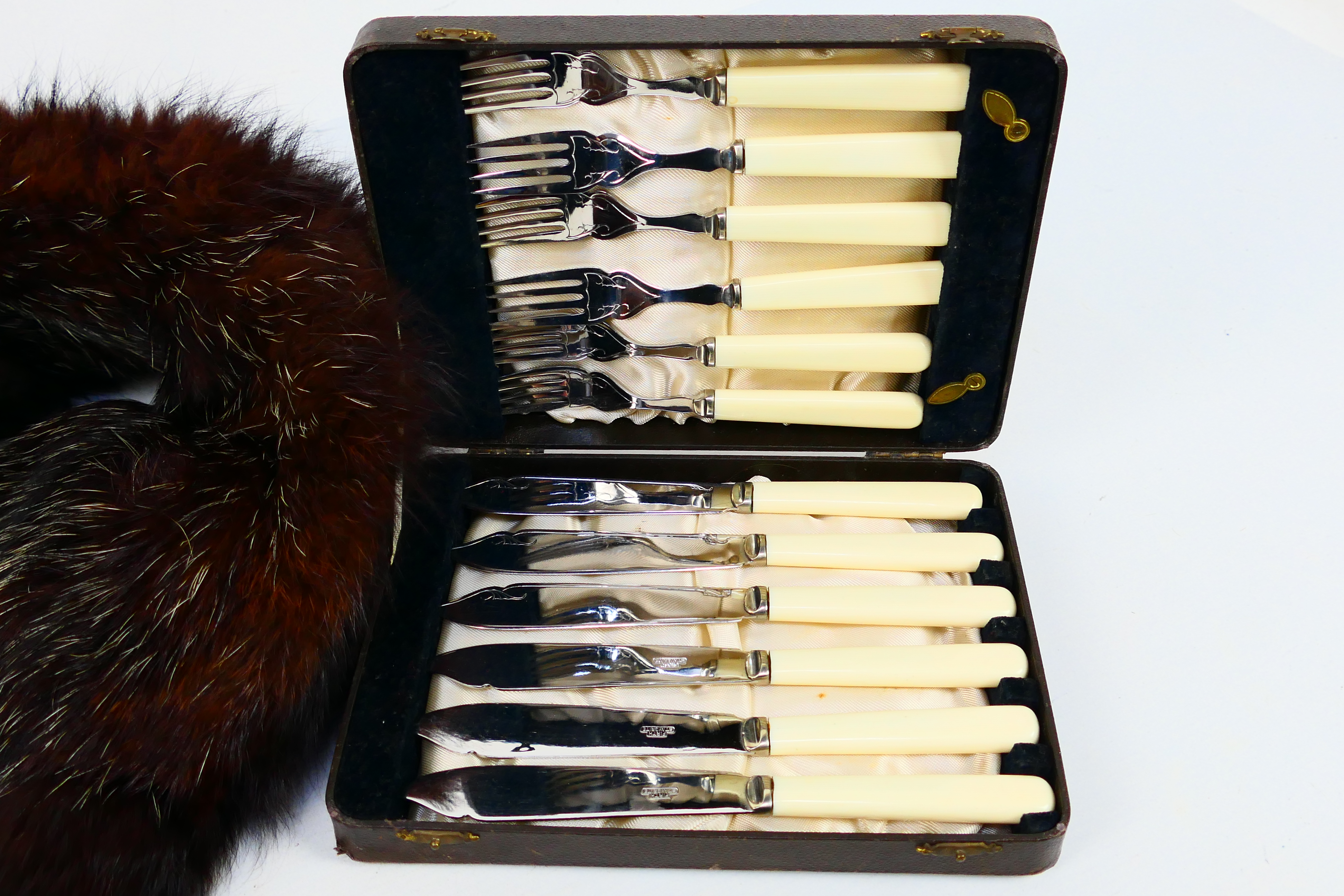 Cased flatware and a fur stole. [W] - Image 2 of 4