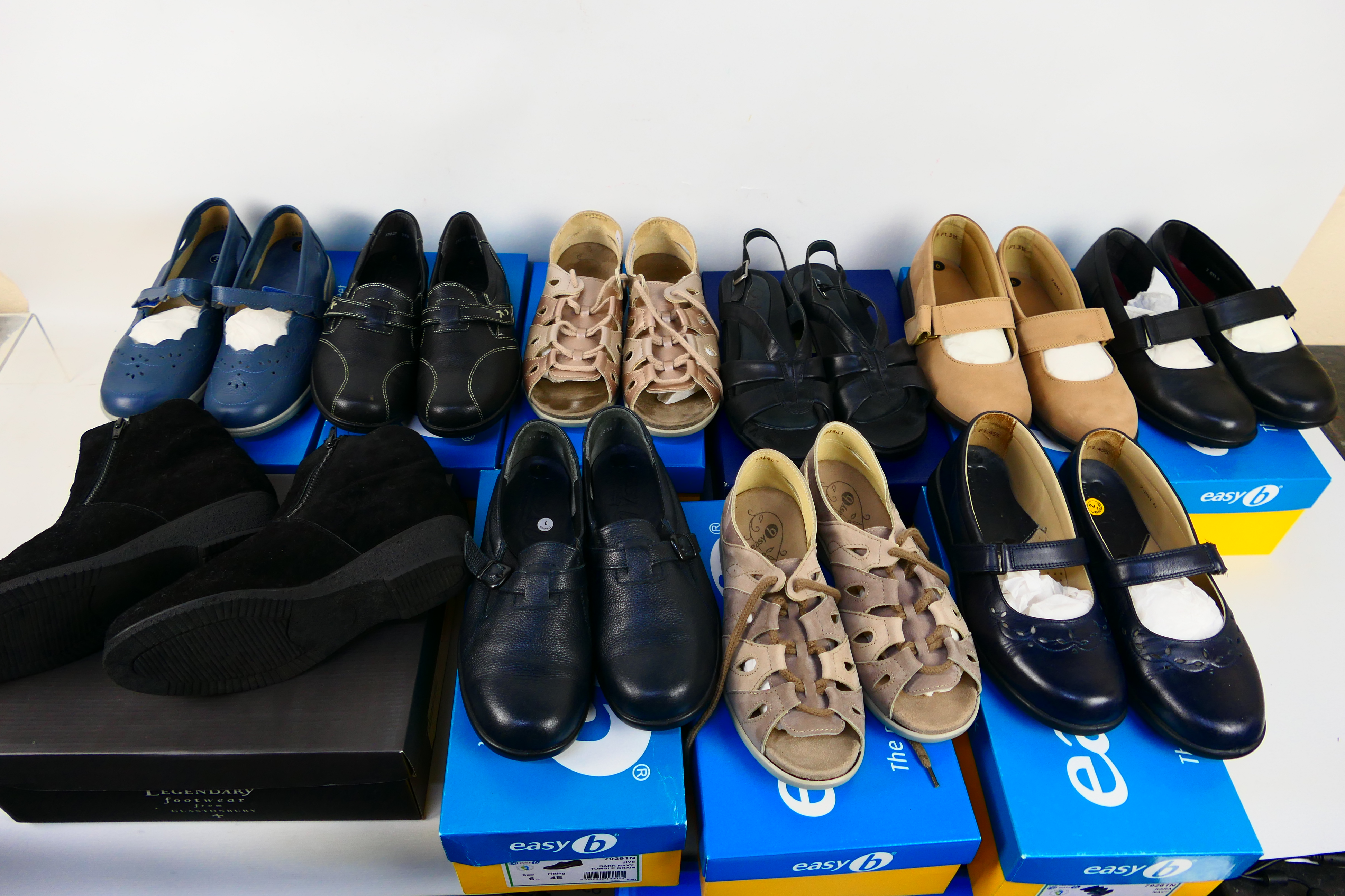 Ten boxed pairs of lady's shoes, all siz