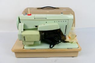 A vintage Singer 258 electric sewing mac