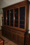 Late 19th Century/early 20th Century oak library cabinet bookcase having five sliding glazed panel
