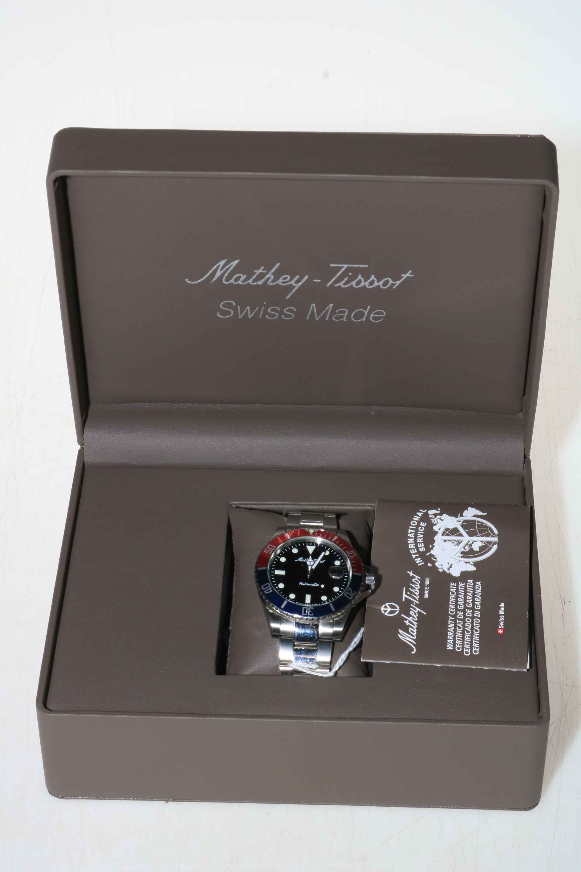 Mathey Tissot automatic wrist watch, in box with paperwork.