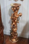 Onyx and gilt figural cherub and vine plant stand, height 106cm.