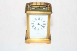 French gilt brass carriage clock retailed by J C Vickery,