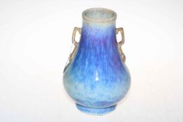 Large Chinese twin handled ovoid vase with mottled blue glaze, Qianlong mark to base, 26cm high.