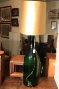 Solomon sized champagne bottle converted to floor lamp, 112cm high.