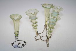 Vaseline glass four trumpet epergne and single vaseline glass epergne.