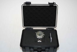 Remt stainless steel wrist watch with box and paperwork.