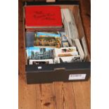 Box of assorted postcards, cigarette card albums etc.