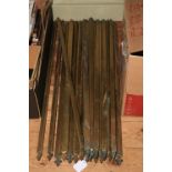 Collection of vintage brass triangular stair rods, approx 19.
