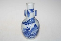 19th Century Chinese blue and white vase decorated with warriors on horseback, 20.5cm high.