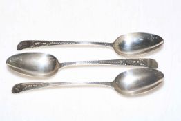 Three Georgian silver bright cut tablespoons.