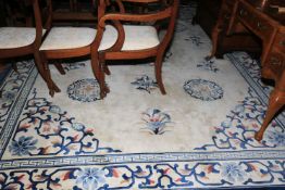 Blue and ivory ground Chinese carpet, 3.70m by 2.77m.