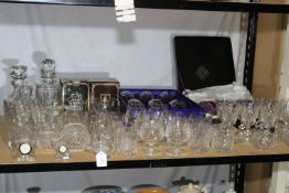 Collection of crystal including Edinburgh crystal with boxes, decanters, clocks etc.