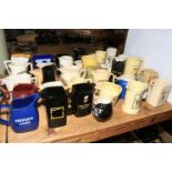 Collection of breweriana jugs, 37 in total.