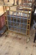 Edwardian satin brass glazed panel fire screen, 80cm by 57.5cm.