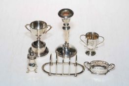 Collection of six small silver items including toast rack and candlestick.