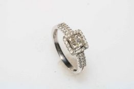 Diamond cluster 18 carat white gold ring, size O.