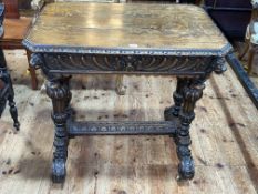 Victorian carved oak single drawer centre table with canted corners, 80cm by 85cm by 59cm.