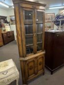 Oak glazed panel door top standing corner cabinet, 183cm.
