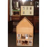 Two dolls houses with furnishings.