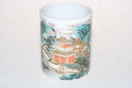 Chinese porcelain brush pot decorated with pagoda in landscape with Qianlong mark to base, 13.