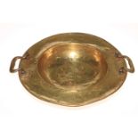 Eastern two handled brass bowl.