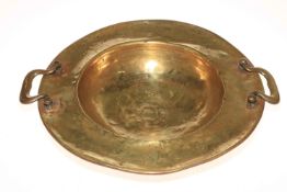Eastern two handled brass bowl.