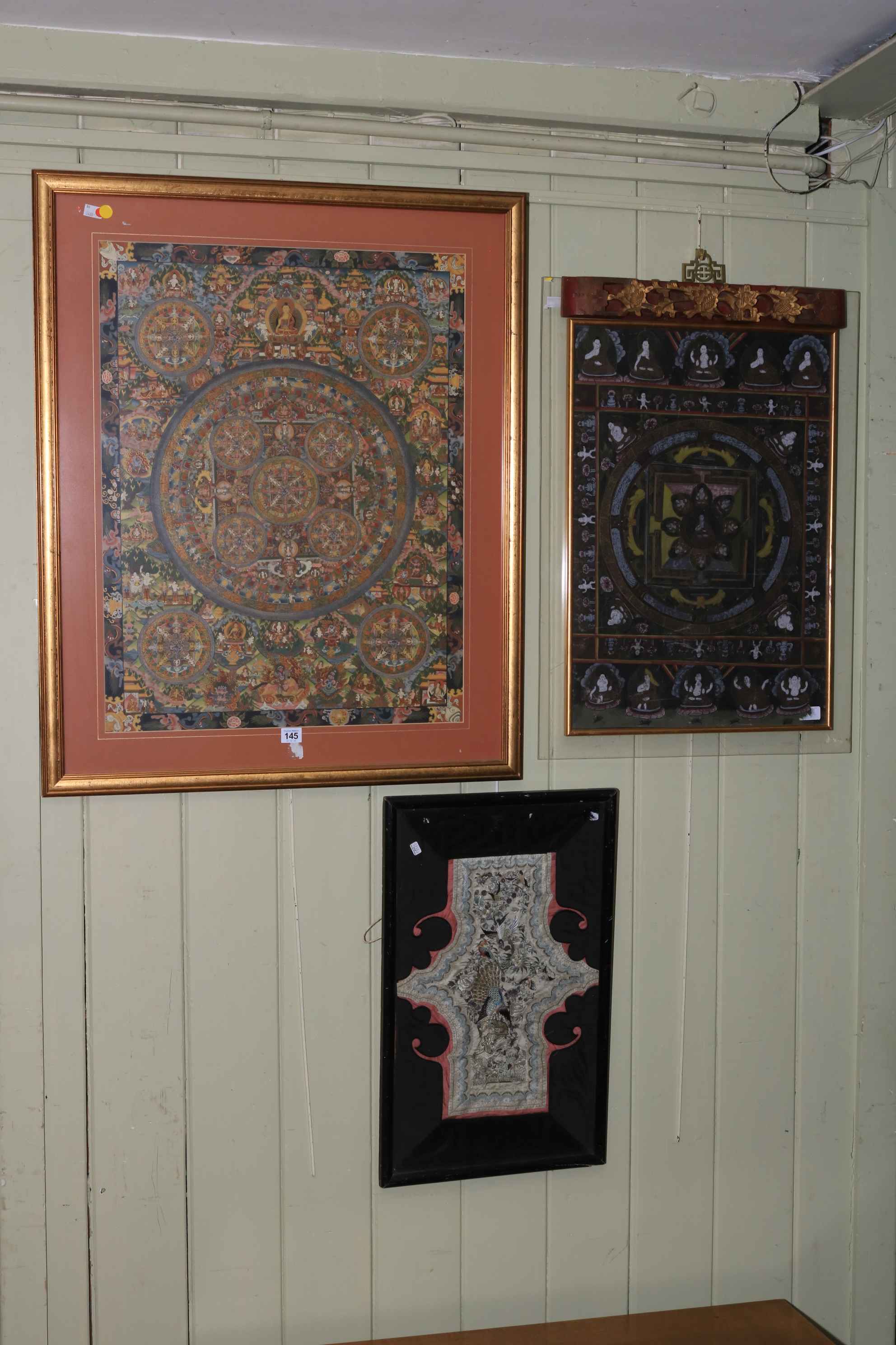 Two Chinese highly decorated pictures and embroidered silkwork picture.