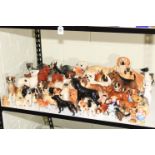 Collection of predominantly dog figurines including Royal Doulton, Beswick, etc.