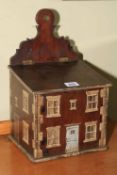 A period style salt box painted as a house, 34cm high.