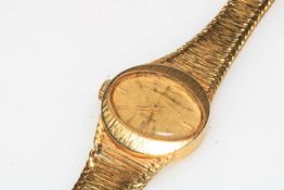 Gold Marvin ladies bracelet watch, strap marked 750.