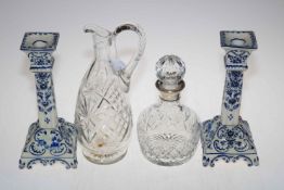 Birmingham silver mounted decanter, cut glass jug and pair of blue and white Delft candlesticks.