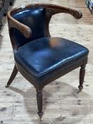 Mahogany framed library chair in black leather.