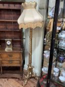Gilt painted triform standard lamp and shade.