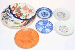 Collection of assorted Chinese and Japanese plates and saucers.