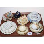 Collection of cabinet cups, saucers and trio's including Doulton, Carlton, Shelley, Royal Winton,