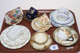 Collection of cabinet cups, saucers and trio's including Doulton, Carlton, Shelley, Royal Winton,