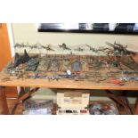 Collection of military aircraft and tank models.