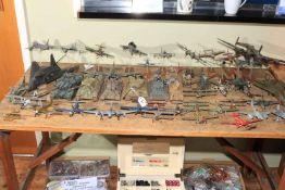Collection of military aircraft and tank models.