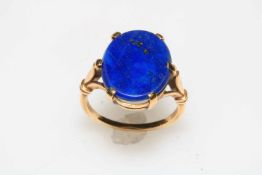 Gold set oval blue stone ring, size M.