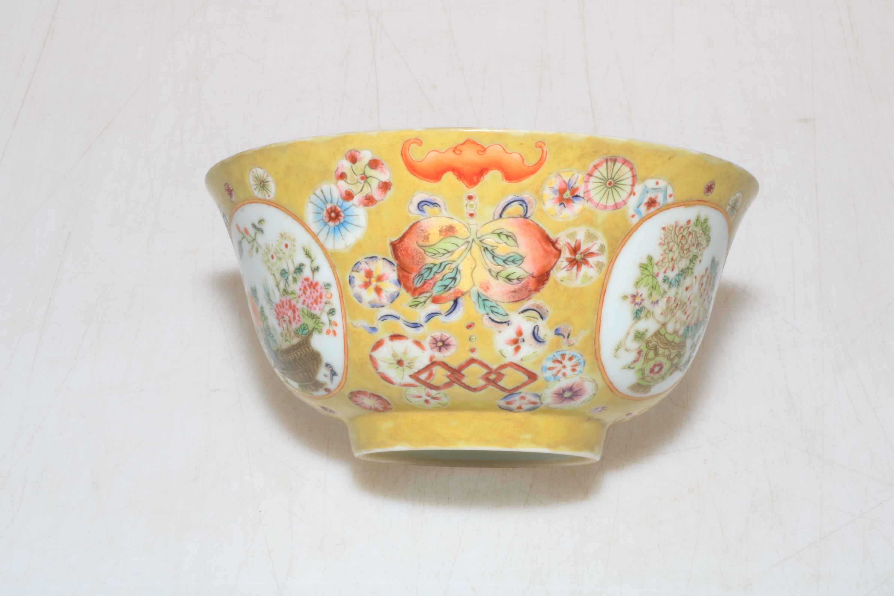 Small Chinese porcelain bowl with floral design on yellow ground, Qianlong mark to base, - Image 2 of 4