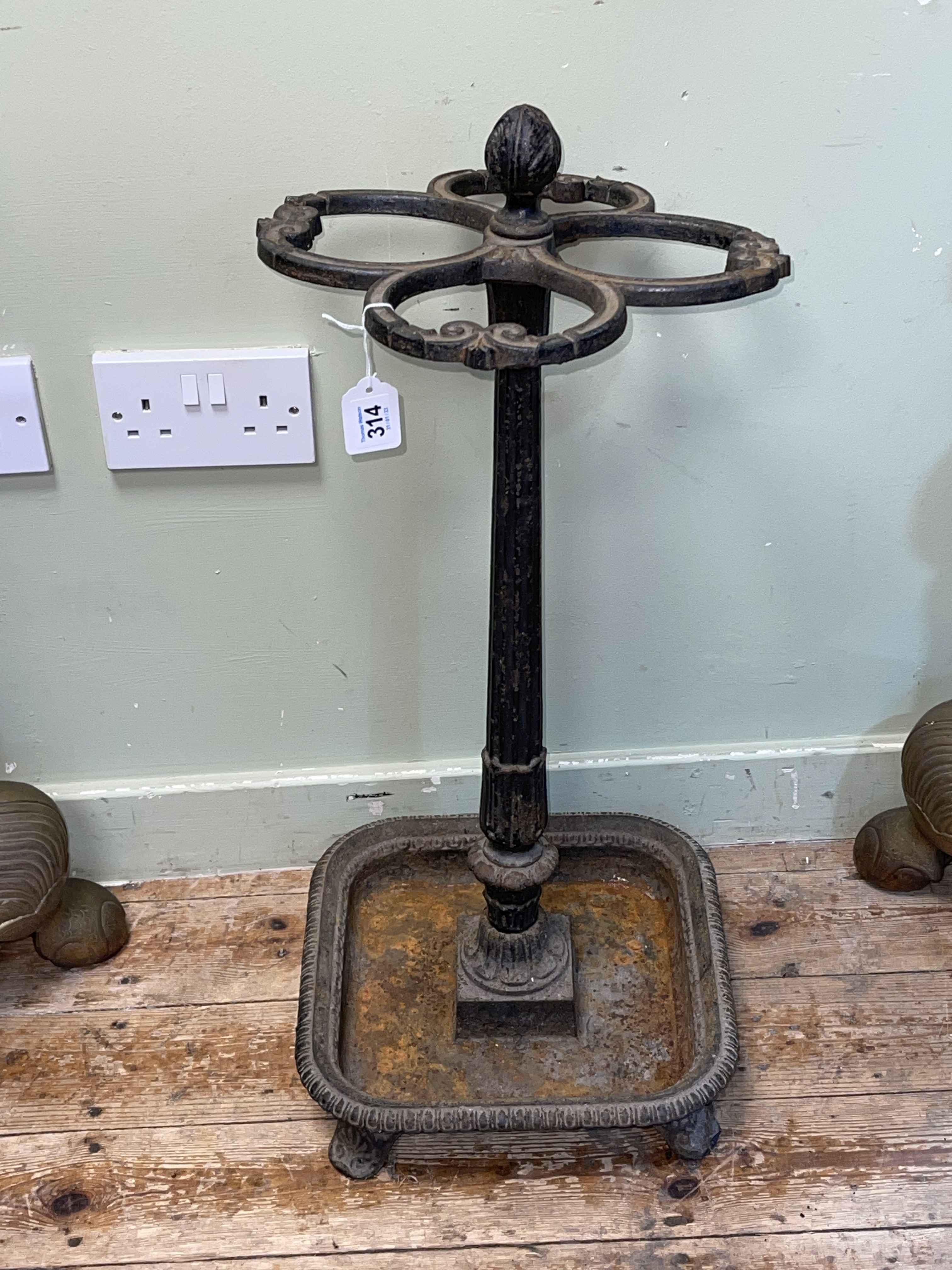 Cast iron four division stick stand, 72cm.