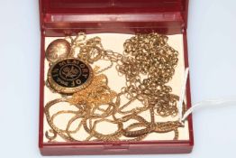 Four 9 carat gold chains, one with locket, memorial locket and chain and other chain (6).