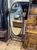 19th Century oval mahogany bevelled cheval mirror, 176cm by 69cm.