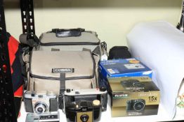 Collection of cameras.