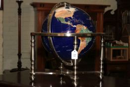Semi-precious stone terrestrial globe and on four legged stand with centralised compass with box.