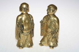 Pair of brass Chinese figures, 23cm high.