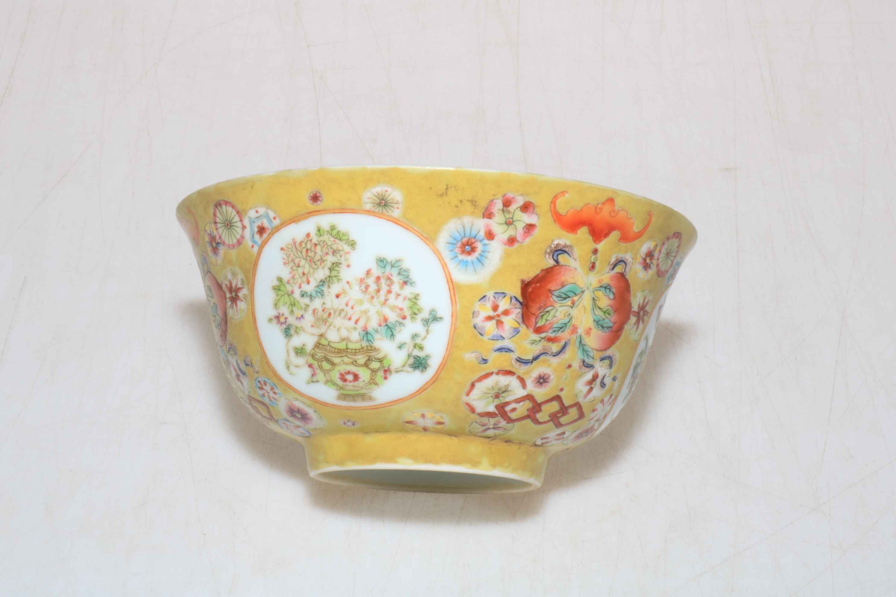 Small Chinese porcelain bowl with floral design on yellow ground, Qianlong mark to base, - Image 3 of 4