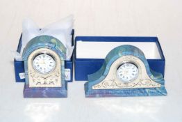 Two R. Carr sterling silver fronted marble effect clocks, boxed.