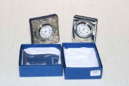 Two R. Carr sterling silver mantel clocks, boxed.